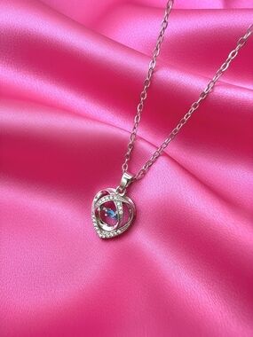 Silver-tone Cubic Zirconia Heart Pendant Necklace with Blue Crystal Accent